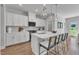 Modern kitchen with white shaker cabinets, quartz countertops, and stainless steel appliances at 8951 Kennebec Crossing Dr # 51, Angier, NC 27501