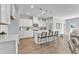Modern kitchen with white shaker cabinets, quartz countertops, and stainless steel appliances at 8951 Kennebec Crossing Dr # 51, Angier, NC 27501