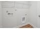 Utility room featuring a utility sink hookups with durable flooring and shelving at 907 Montague Ave, Durham, NC 27703