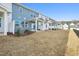 The backyard features manicured lawn space with privacy fence, perfect for outdoor activities and entertaining at 911 Montague Ave, Durham, NC 27703