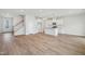 Open-concept living space with a stylish kitchen, hardwood floors, and ample natural light at 911 Montague Ave, Durham, NC 27703