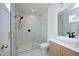 Bathroom with marble shower and modern vanity at 914 Ardmore Dr, Durham, NC 27713