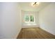 Bedroom with hardwood floors and a built-in window seat at 914 Ardmore Dr, Durham, NC 27713