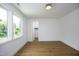 Light-filled bedroom with hardwood floors and a closet at 914 Ardmore Dr, Durham, NC 27713