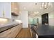 Modern kitchen with stainless steel appliances and dark countertops at 914 Ardmore Dr, Durham, NC 27713