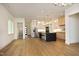 Modern kitchen with a large island, stainless steel appliances, and light oak floors at 914 Ardmore Dr, Durham, NC 27713