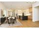 Open concept kitchen with large island, stainless appliances, and dining area with modern lighting at 914 Ardmore Dr, Durham, NC 27713