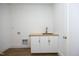 Laundry room with butcher block countertop and modern sink at 914 Ardmore Dr, Durham, NC 27713