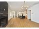 Open concept living room with hardwood floors and modern kitchen at 914 Ardmore Dr, Durham, NC 27713