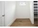 Bright walk-in pantry with wood flooring and ample shelving at 914 Ardmore Dr, Durham, NC 27713
