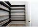 Spacious pantry with ample shelving for storage at 914 Ardmore Dr, Durham, NC 27713