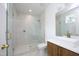 Elegant bathroom with marble shower and floating vanity at 916 Ardmore Dr, Durham, NC 27713