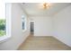 Bright bedroom with hardwood floors and access to closet at 916 Ardmore Dr, Durham, NC 27713