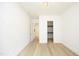 Bright bedroom with hardwood floors, access to a closet and hallway at 916 Ardmore Dr, Durham, NC 27713