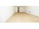 Spacious bonus room with hardwood floors and access to hallway at 916 Ardmore Dr, Durham, NC 27713