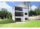Three-story home with a screened porch and backyard at 916 Ardmore Dr, Durham, NC 27713
