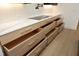 Light oak kitchen drawers offer ample storage space at 916 Ardmore Dr, Durham, NC 27713