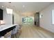 Open living room with hardwood floors and fireplace at 916 Ardmore Dr, Durham, NC 27713