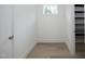 Bright walk-in pantry with ample shelving for storage at 916 Ardmore Dr, Durham, NC 27713