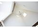 Modern light-filled stairwell with geometric chandelier at 916 Ardmore Dr, Durham, NC 27713
