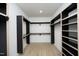 Spacious walk-in closet with ample shelving and hanging space at 916 Ardmore Dr, Durham, NC 27713
