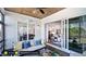 Relaxing covered porch with comfortable seating overlooking backyard at 1 Kelsey Ct, Hillsborough, NC 27278