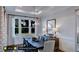 Bright dining room with chandelier and view of backyard at 1 Kelsey Ct, Hillsborough, NC 27278