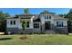 Two story home with gray stone and white exterior at 1 Kelsey Ct, Hillsborough, NC 27278