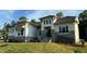 Modern home with gray stone and white exterior at 1 Kelsey Ct, Hillsborough, NC 27278