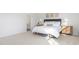 Main bedroom with plush carpet and a large bed at 111 Reagan Crest Dr, Clayton, NC 27520