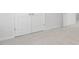 Spacious bedroom with carpet flooring and double doors at 111 Reagan Crest Dr, Clayton, NC 27520