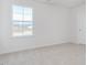 Bright bedroom with carpet and a window view at 111 Reagan Crest Dr, Clayton, NC 27520