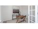 Bright home office features wood desk, and neutral decor at 111 Reagan Crest Dr, Clayton, NC 27520