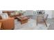 Living room features a brown sectional sofa and coffee table at 111 Reagan Crest Dr, Clayton, NC 27520