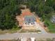 New construction home with an unfinished yard and a wooded backdrop offers a serene setting at 1117 Delilia Ln, Wake Forest, NC 27587