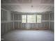 Spacious room featuring a large window at 1117 Delilia Ln, Wake Forest, NC 27587