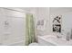Clean bathroom with tub shower and vanity at 115 Reagan Crest Dr, Clayton, NC 27520