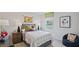Bedroom with a full bed, nightstands, and a beanbag chair at 115 Reagan Crest Dr, Clayton, NC 27520