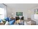 Spacious living room with sectional sofa and large window at 115 Reagan Crest Dr, Clayton, NC 27520