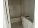 Bathroom featuring white vanity, drawers and tub with clean lines and a modern design at 132 Black Cloud Dr, Louisburg, NC 27549