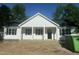 Charming new construction featuring a welcoming front porch and classic white siding at 132 Black Cloud Dr, Louisburg, NC 27549