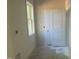 Hallway with natural light leading to other rooms, offering convenience and charm at 132 Black Cloud Dr, Louisburg, NC 27549