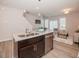 Kitchen island with granite countertops and stainless steel dishwasher at 152 Rolesville Ridge Dr, Rolesville, NC 27571