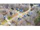 Neighborhood wide aerial view showing multiple houses at 300 Ashwick Dr, Efland, NC 27243