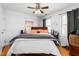 Bright bedroom with double bed and two windows at 300 Ashwick Dr, Efland, NC 27243
