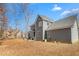 Gray house exterior with backyard patio at 300 Ashwick Dr, Efland, NC 27243
