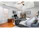 Spacious main bedroom with a large bed and ceiling fan at 300 Ashwick Dr, Efland, NC 27243