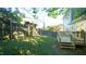 Fenced backyard with a deck and green grass at 300 Worth St, Raleigh, NC 27601