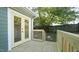 Deck with French doors leading to the house and a fenced backyard at 300 Worth St, Raleigh, NC 27601