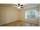 Well-lit bedroom with hardwood floors and a ceiling fan at 300 Worth St, Raleigh, NC 27601